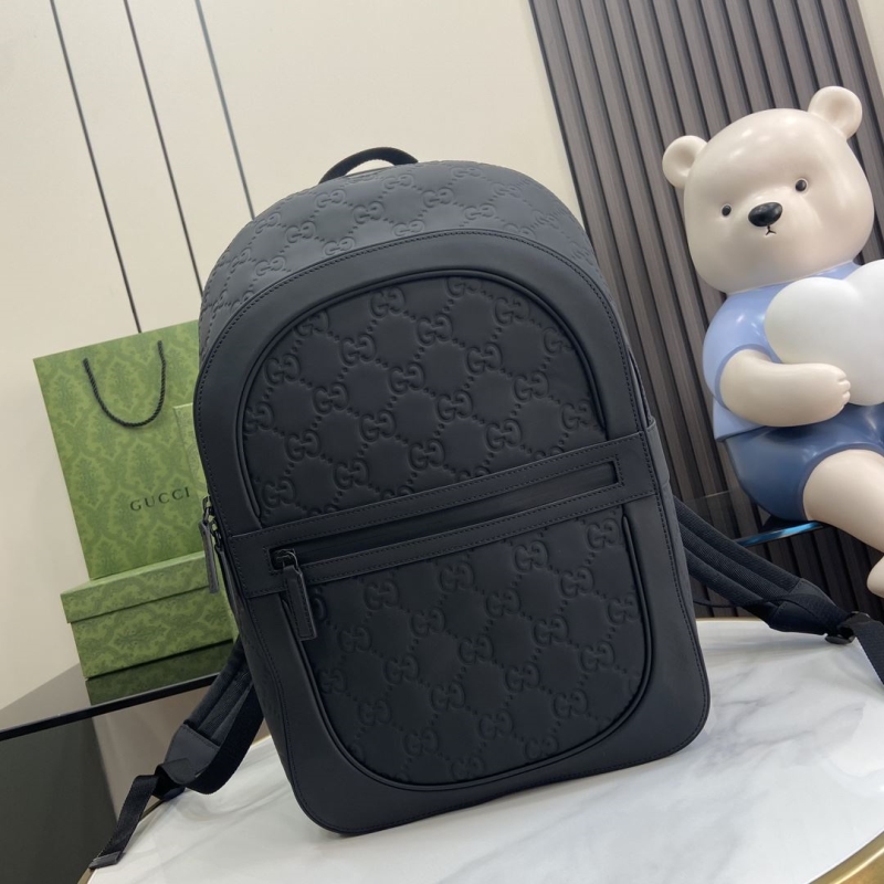 G*u*i backpacks